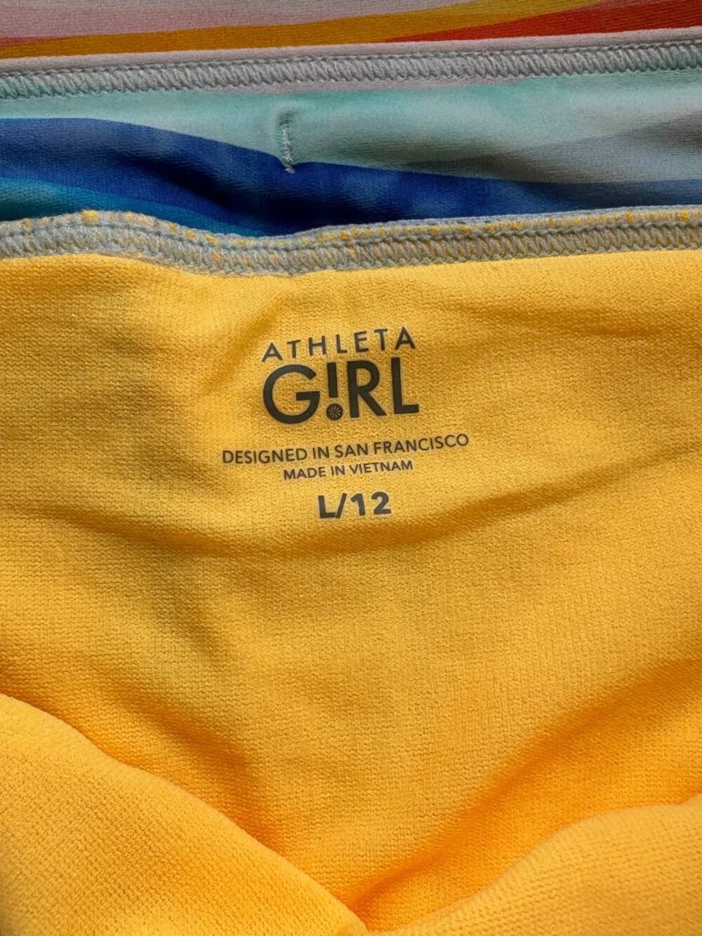 Athleta Girl Cannonball Swim Shorts Rainbow Stripe L 12 Board Shorts UPF
